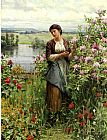 Daniel Ridgway Knight Famous Paintings - Julia among the Roses
